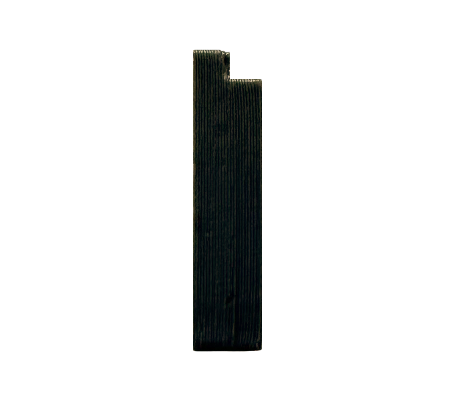 A vertical, rectangular object with a textured surface and a notch at the top. The object appears dark in color and has fine grooves running along its length, suggesting it may be a tool or a component used in mechanical applications.