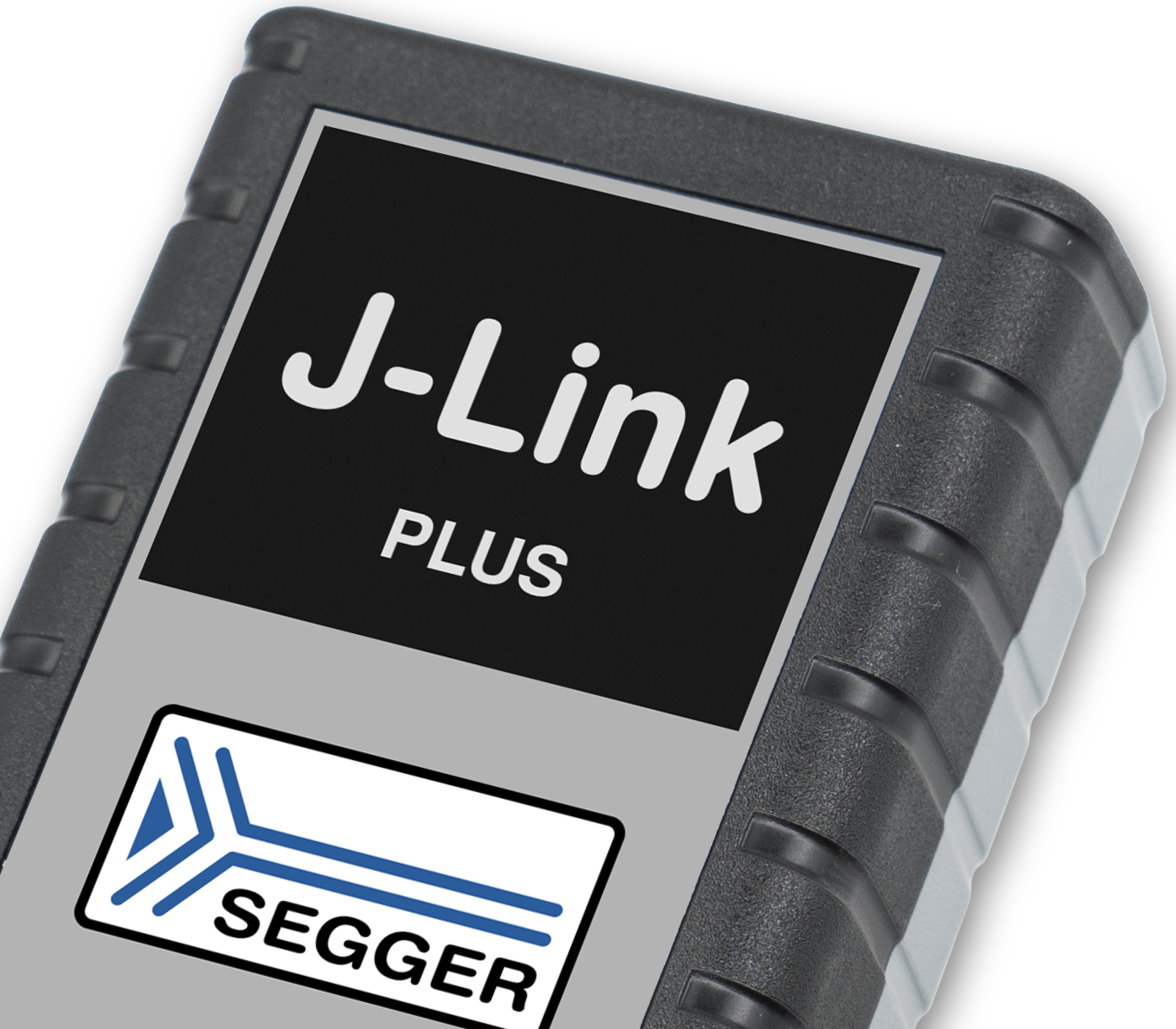 Image of a J-Link Plus debugging probe by SEGGER. The device features a textured gray casing with a prominent black label displaying "J-Link" and "PLUS." The SEGGER logo, a stylized blue arrow, is also visible on the label.